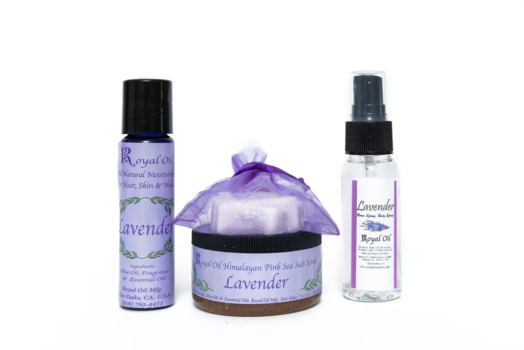 Set of lavender-themed products including a bottle, a jar, and a spray bottle on a white background.