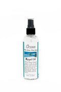 Bottle of 'Ocean Royal Oil' with a label on a white background