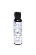 Bottle of Royal Cut Patchouli oil on a white background