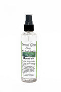 Bottle of Lemon Grass Sage body spray with a white label on a white background