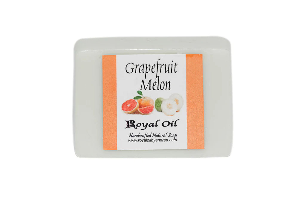 Bar of soap with a label indicating 'Grapefruit Melon' fragrance on a white background