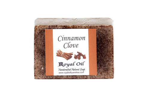 Bar of cinnamon clove soap with a label on a white background
